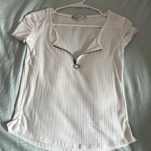 slightly off white tee with a zipper, size xs